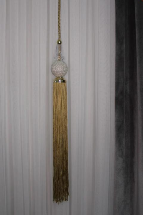 Parelmoerkleurige hangermodellen