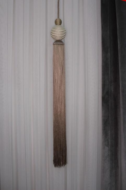 Parelmoerkleurige hangermodellen